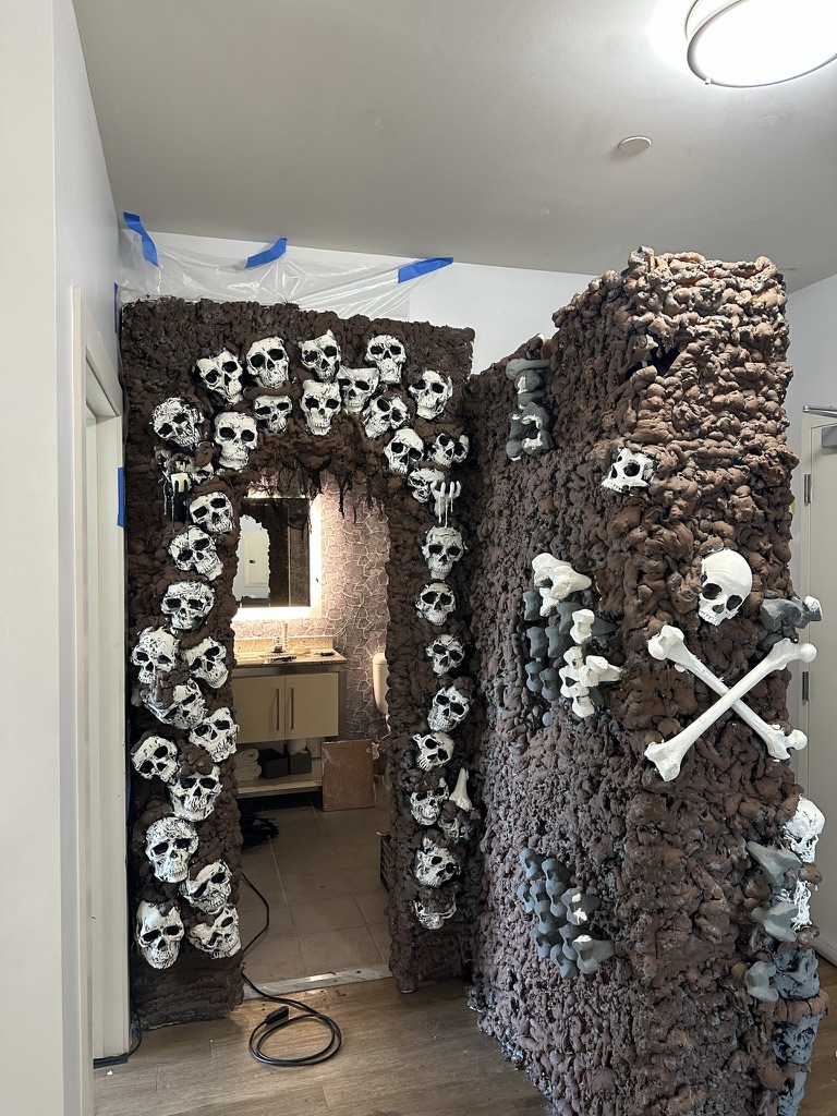 The completed skull-and-bone entrance in daylight.