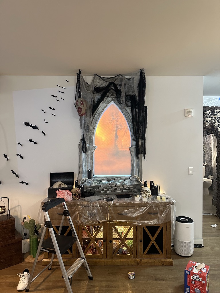 Window projection, candlelight, and finishing touches come together.