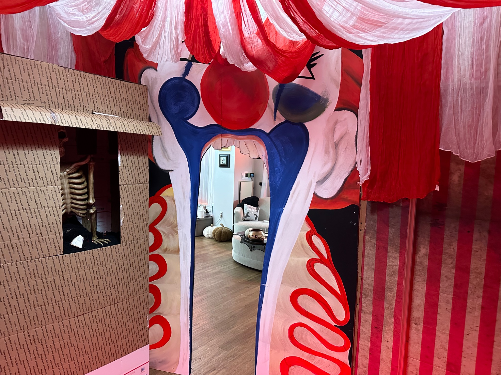 The painted clown entrance is fitted beside the booth.