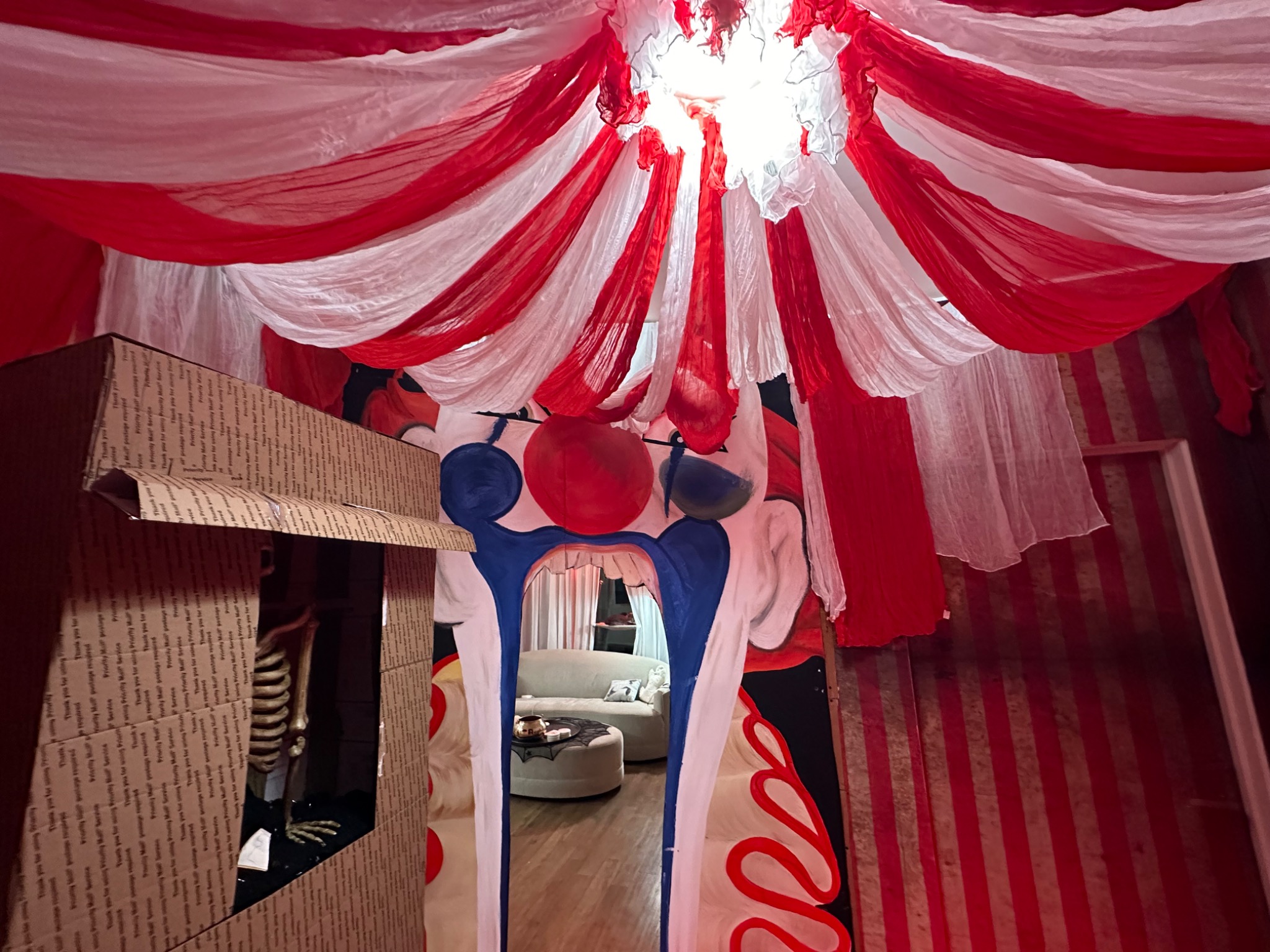 The canopy, booth, and clown doorway together in daylight.