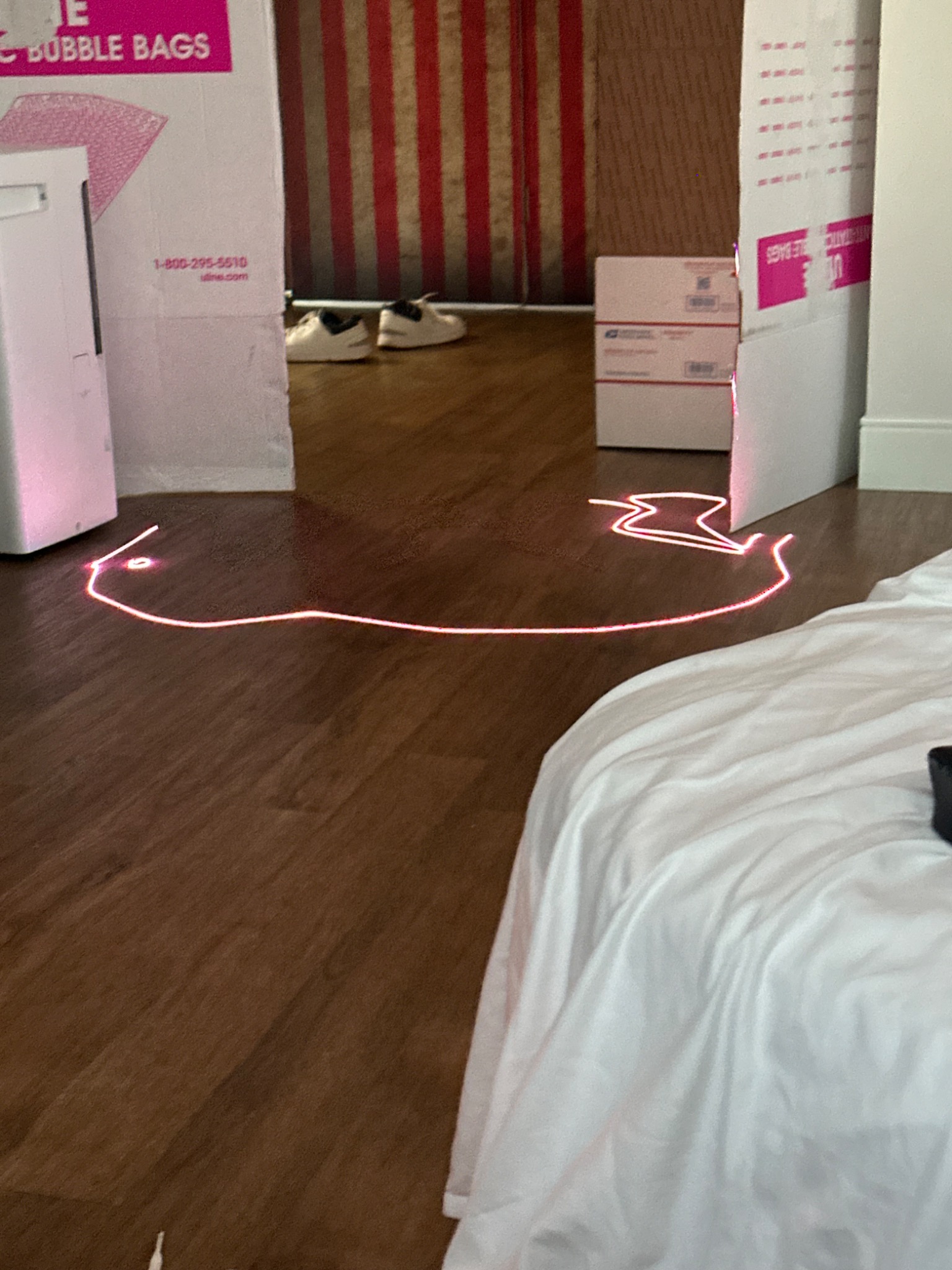 Testing a projected shape on the floor.