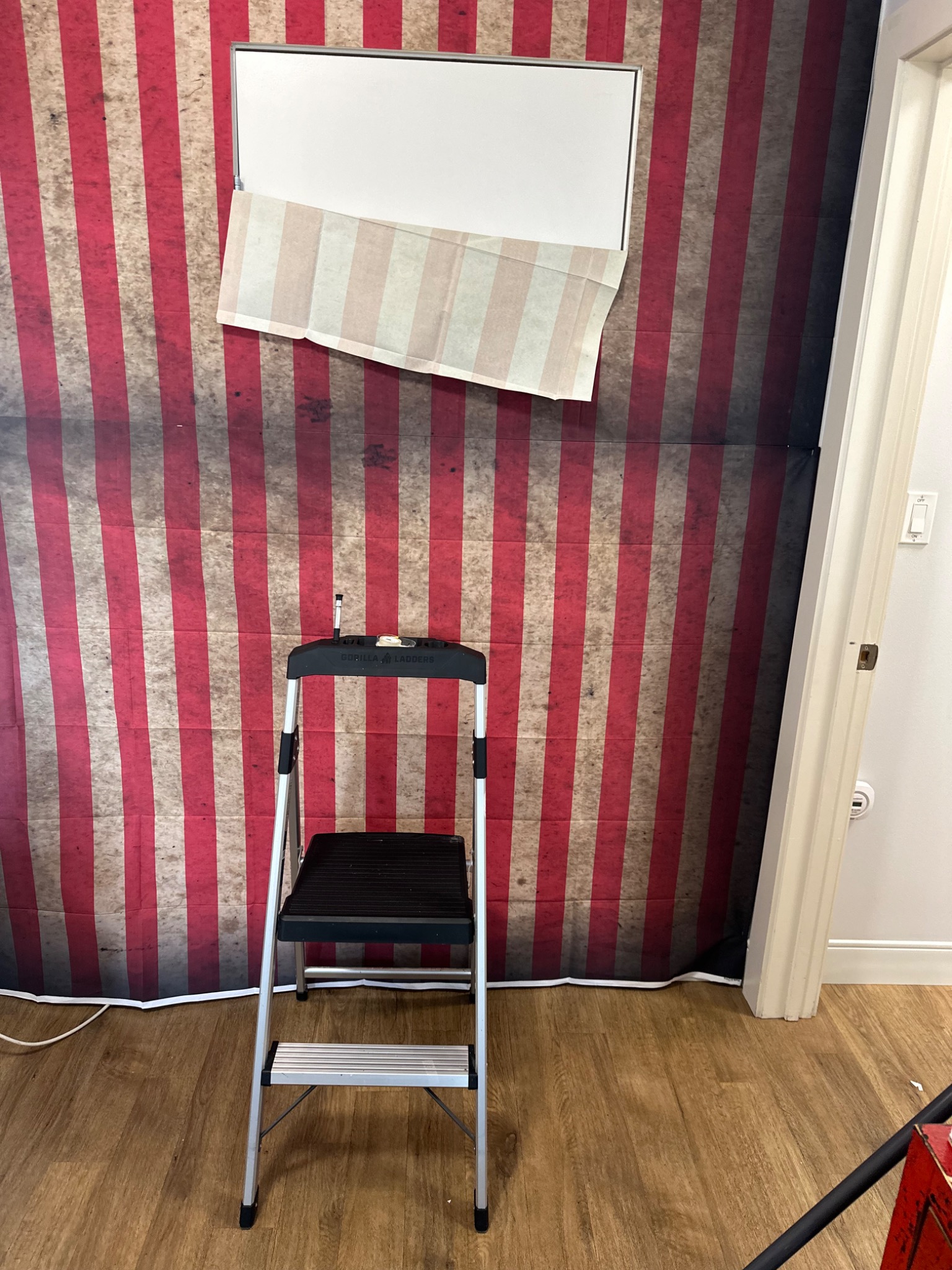 Red-and-cream stripes establish the carnival walls.